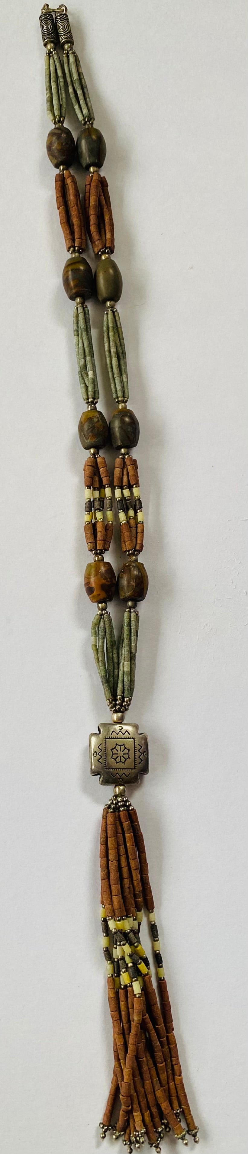 Bolo Beaded Necklace With Carved Tribal Motif